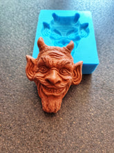 Load image into Gallery viewer, Mocking devil's head Silicone Mold (11x8.5x3.2cm), for the production of repetitions of hand-made sculptures