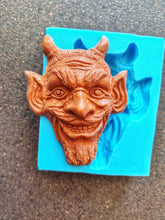 Load image into Gallery viewer, Mocking devil's head Silicone Mold (11x8.5x3.2cm), for the production of repetitions of hand-made sculptures
