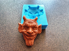 Load image into Gallery viewer, Mocking devil's head Silicone Mold (11x8.5x3.2cm), for the production of repetitions of hand-made sculptures
