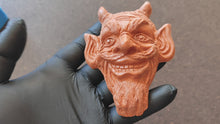 Load and play video in Gallery viewer, Mocking devil's head Silicone Mold (11x8.5x3.2cm), for the production of repetitions of hand-made sculptures
